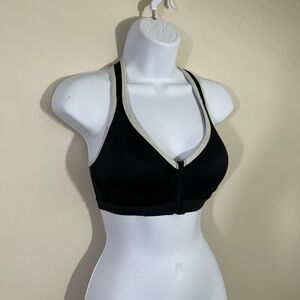 Danskin Now sz 34B sports bra black with white trim